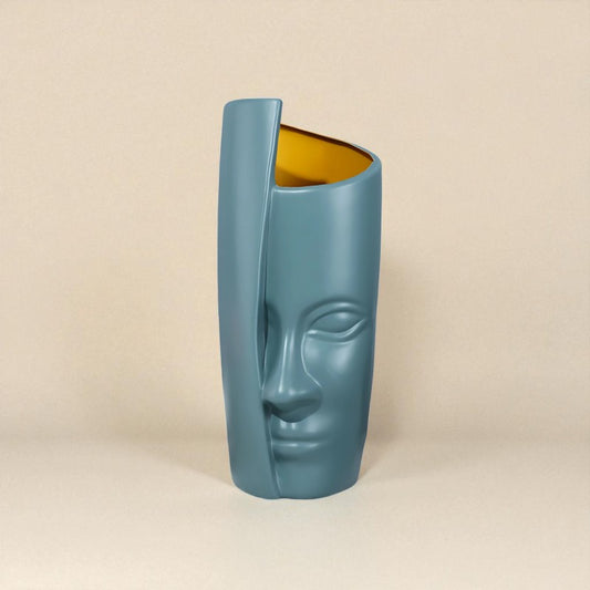 Vase demi visage caché vert